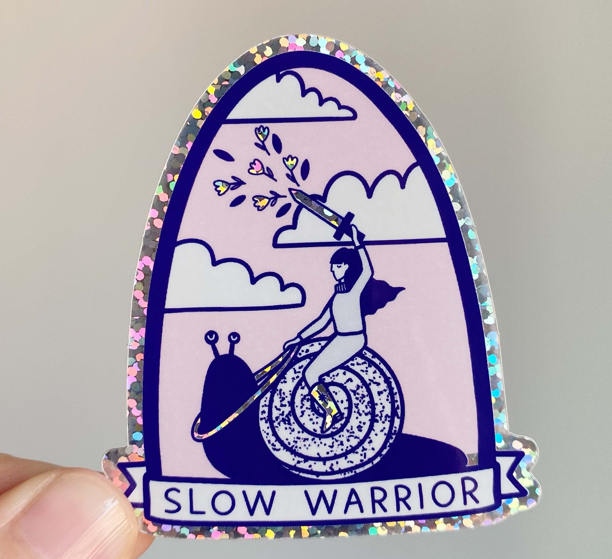 Glittery vinyl 'Slow Warrior' sticker! Celebrate slow living and a mindful life. Perfect for decorating laptops or notebooks. Water and UV- resistant. Sales support nature conservation through European Rewilding projects!